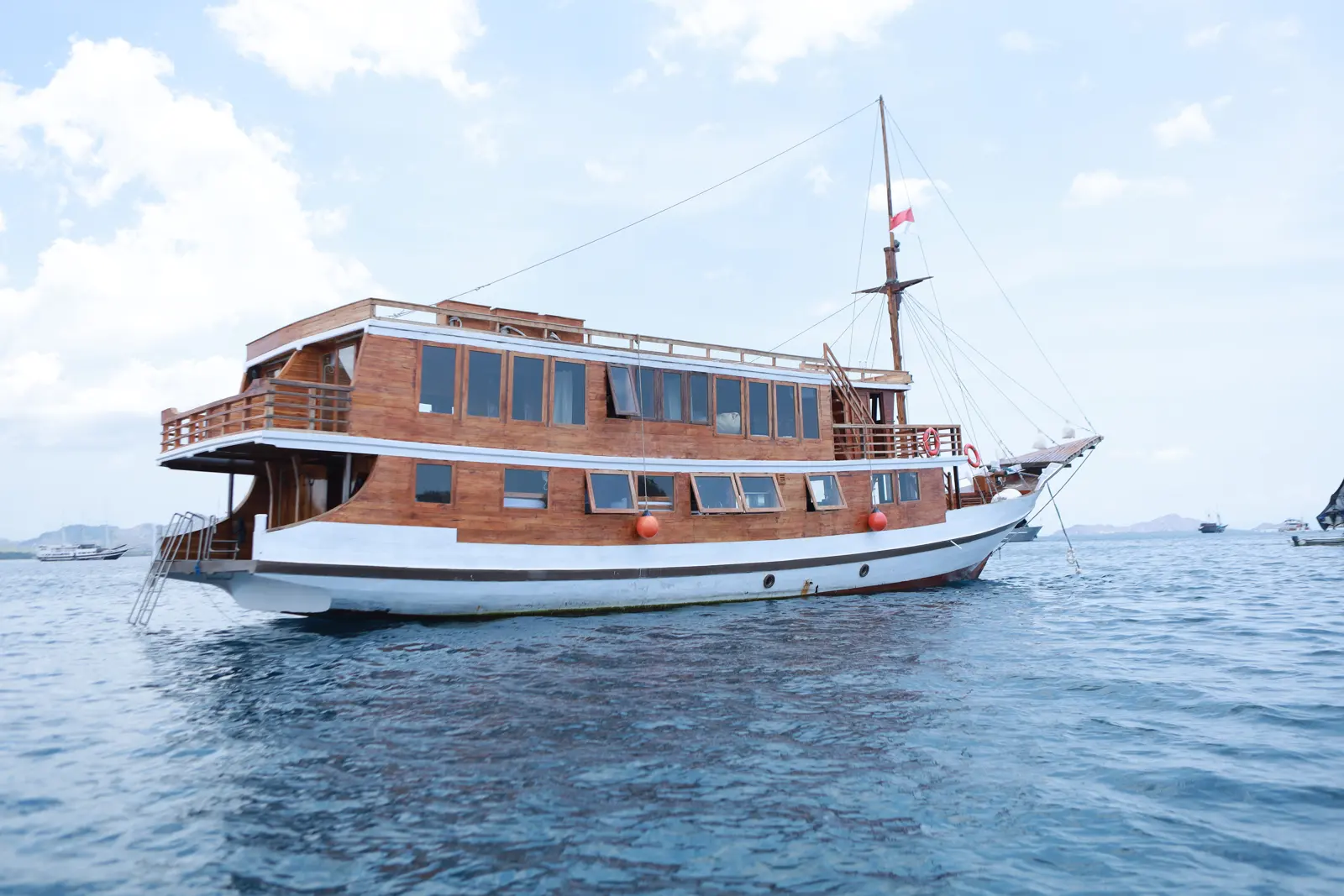 Aimar stern with two decks of windows and the Indonesian flag flying