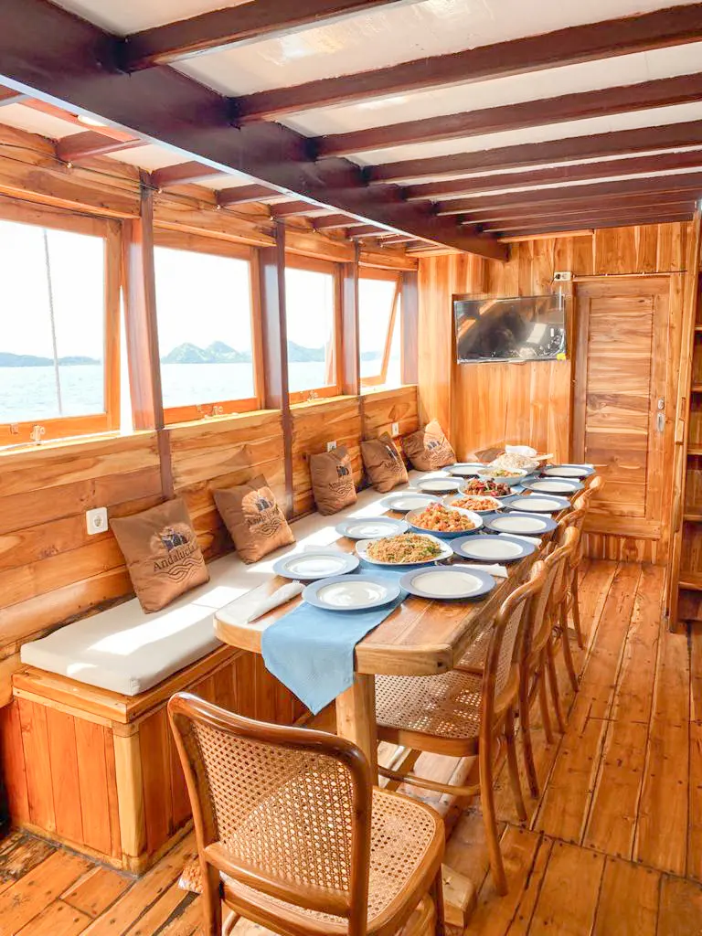 Andalucia 2 indoor dining room with a long table and sea windows