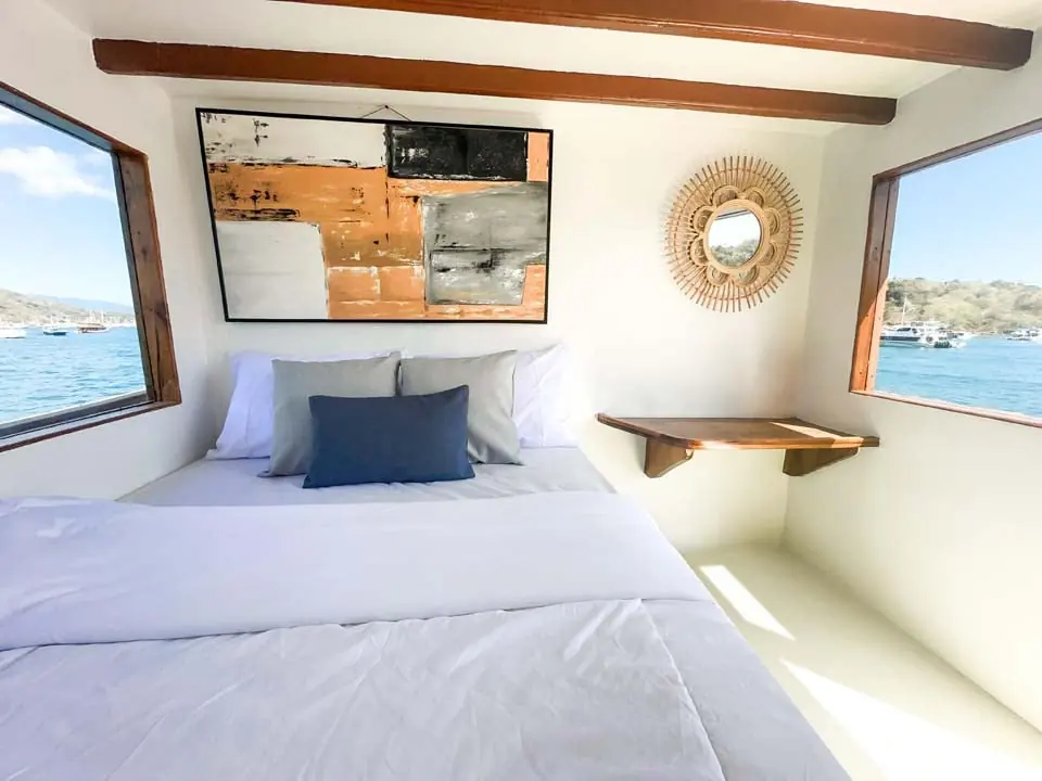 Master Room bed on North Blue with windows on both sides