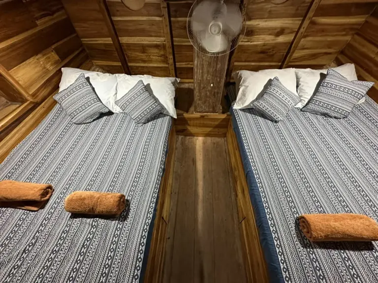 Cabin 3 on Sabbar Cruise, two double beds side by side in a wooden cabin